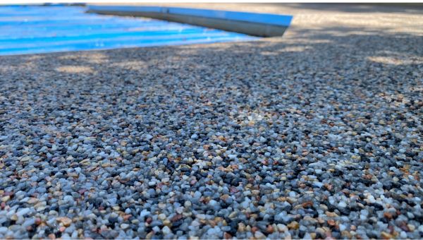 Keep Your Pool Deck and Lawn Looking Great with Gravel and Pour On